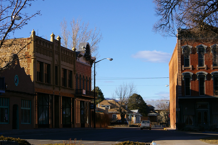 A shot of the upper plaza in Las Vegas, NM with the Plaza Hotel on the right.