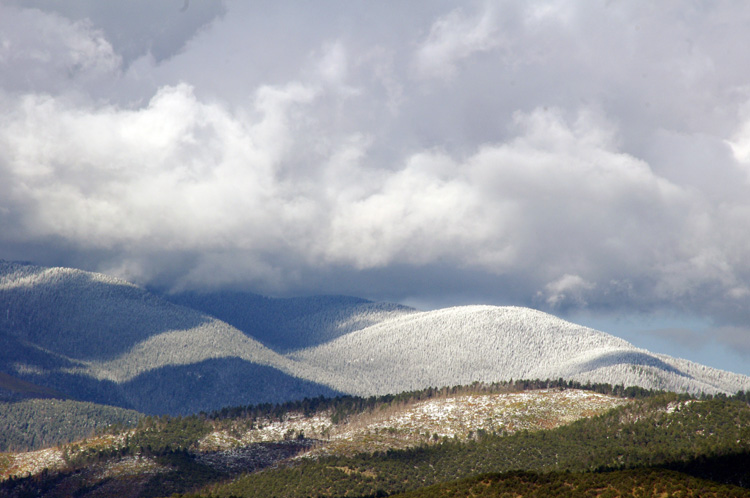 Early snow on lower slopes of Taos Mountain