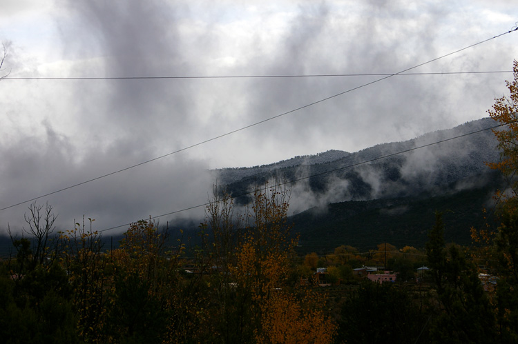 Mist and hints of snow on the Talpa hills, south of Taos, New Mexico.