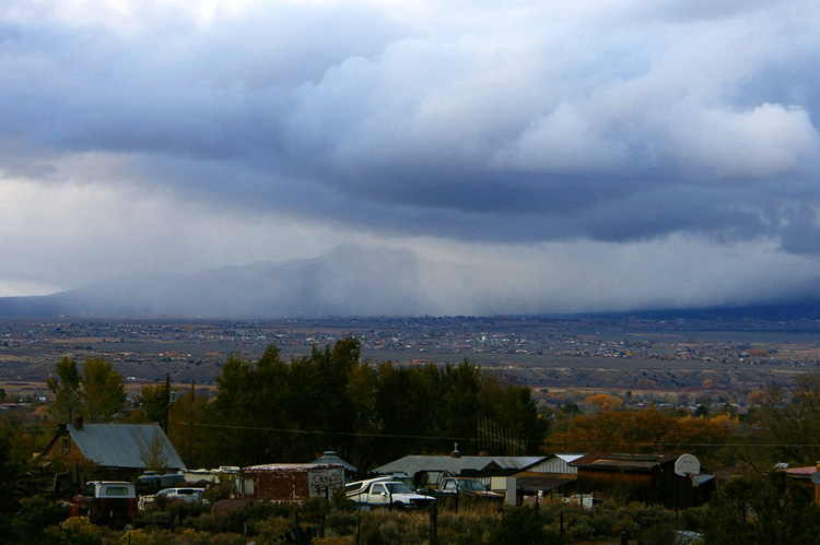 snow shower moving east toward Arroyo Seco, New Mexico