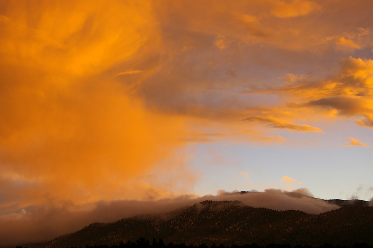 Orange sunset clouds south of Taos