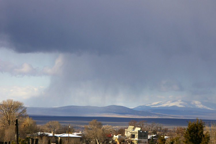 Snow virga west of Taos, New Mexico.