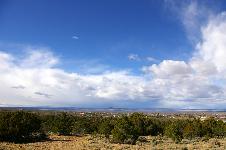 Colorado snow heads for Taos under big blue skies...