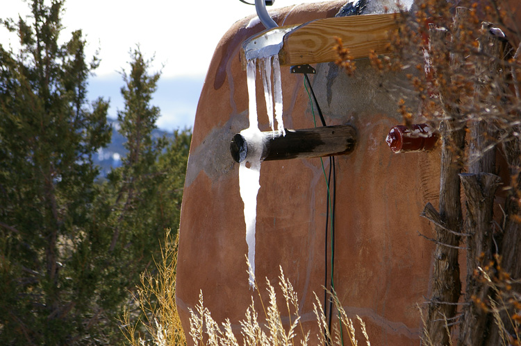 Ice forms on a house near Taos, NM