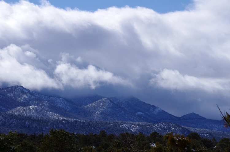 Snow and clouds on the mountains south of Picuris Peak near Taos, NM.