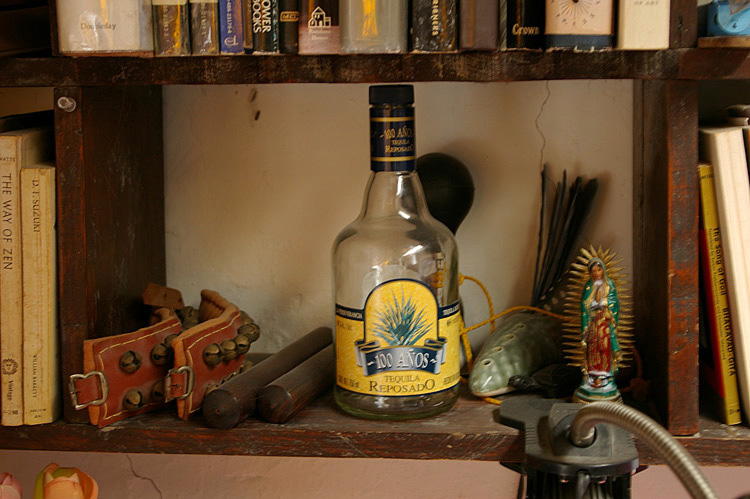 a tequila bottle on a shelf in Taos, New Mexico