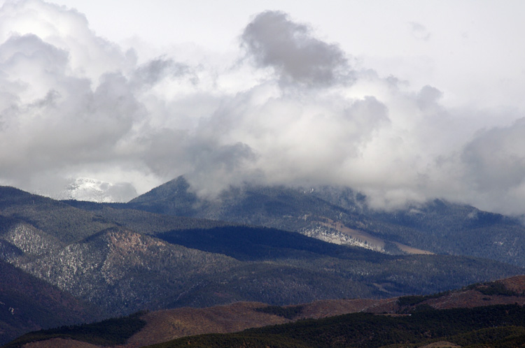 Clouds on the mountains in Taos