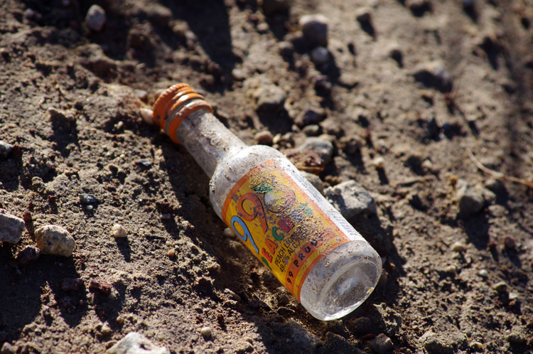 liquour bottle in the road