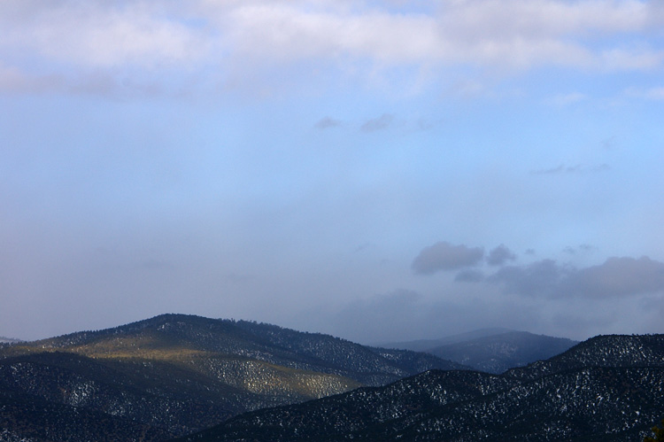 Soft evening light on the Talpa Hills southeast of Taos, New Mexico.