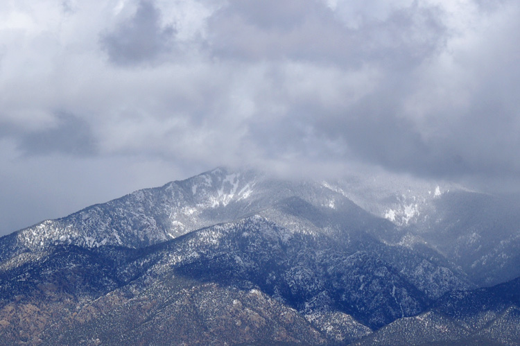 Taos Mountain and snow clouds, close-up