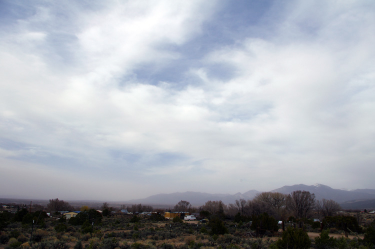 Mountains and dust. Spring in Taos, NM.