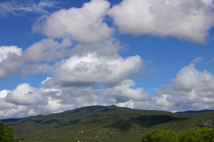 View across the Talpa Valley from Llano Quemado after a rain.