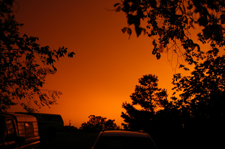 sunset light through rain near Taos